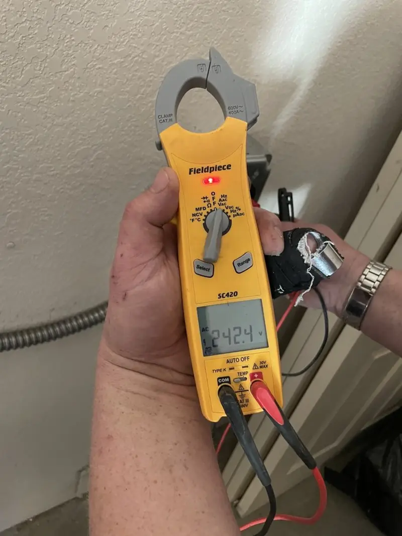 Voltage testing with clamp meter during Generator Installation in Sterling